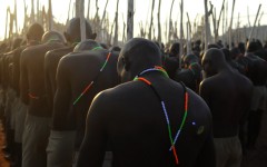 Initiates gather in a group as they return home. AFP/Lucas Ledwaba