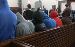 11 officers in the dock