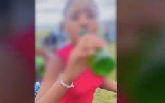 One of the children caught drinking.