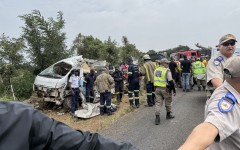 Rescue workers and South African Police Service (SAPS) forensic team members at the scene of the Vaal scholar transport accident. AFP/John Mkhize