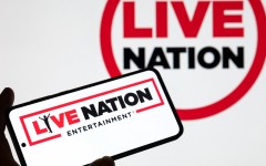 The Live Nation logo is displayed on a mobile phone with the company's branding. Jonathan Raa/NurPhoto via AFP