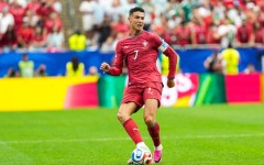 Portugal's #7 forward Cristiano Ronaldo, passes the ball. McGuelber / Odyssey Images via AFP