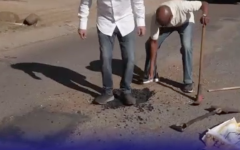 Sandown Estate residents in Sandton fixing potholes.