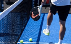 A ball and racket used to play padel tennis. AFP/Alain Jocard