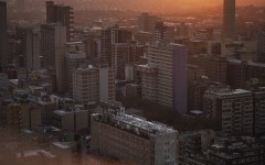 A general view of high-rise buildings of the Johannesburg skyline from the 51th floor of Ponte City, also known as Ponte Tower, in Berea, Johannesburg on May 24, 2024. (Photo by Michele Spatari / AFP)