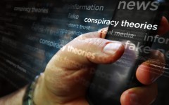 File: Social media on display with conspiracy theories, hoax theory and fake news. GettyImages/Arkadiusz Wargula