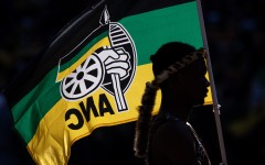 A performer holds an ANC flag while listening to President of the ruling African National Congress (ANC) and South African President, Cyril Ramaphosa speak during the ANC Siyanqoba Rally held at FNB Stadium on May 25, 2024 in Johannesburg, South Africa. South Africa's national and provincial elections will be held on 29 May 2024 to elect a new National Assembly and provincial legislature in each of the nine provinces. (Photo by Chris McGrath/Getty Images)