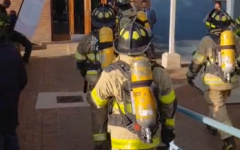 Firefighters on their way into the Madlanga Commission venue. eNCA