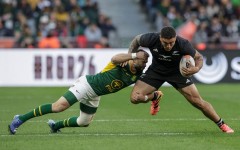 Cobus Reinach tackles New Zealand's hooker Codie Taylor 