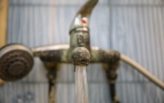 File: Water flows from a tap. Chedly Ben Ibrahim/NurPhoto via AFP