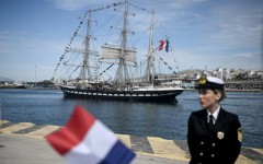 The Olympic torch begins its sea journey to France on the Belem from Piraeus