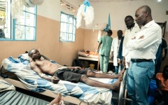 South Kivu Governor Jean-Jaques Purusi Sadiki (R) visited Uvira General Hospital as local people described growing panic