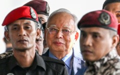 Former Malaysian prime minister Najib Razak (C) was found guilty in the 1MDB financial scandal
