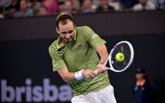 Daniil Medvedev hits a return during his men's singles final against Brandon Nakashima at the Brisbane International