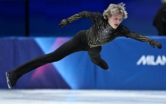 Ilia Malinin takes off in the routine that earned the USA figure skating team gold at the Milan-Cortina Winter Olympics