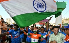 Cricket fans cheer as they arrive to watch the 2026 ICC Men's T20 Cricket World Cup final match