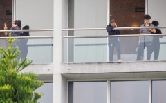 Members of the Iranian women’s football team are seen on their respective room balconies at the Royal Pines Resort on the Gold Coast on March 9, 2026