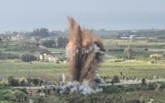 Smoke rises from an Israeli airstrike on the Qasmiyeh bridge in south Lebanon