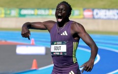 Gout Gout celebrates winning the 200m in 19.67 seconds at the Australian Athletics Championships in Sydney