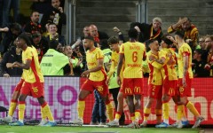 Lens celebrate after the goal from Mezian Mesloub Soares (2nd R) that secured them Champions League football next season