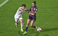 North Korea's Naegohyang Women's FC defender Ri Myong Gum (left) vies for the ball with South Korea's Suwon FC Women forward Mileninha Barreto de Oliveira during their Women's Asian Champions League semi-final at Suwon Sports Complex