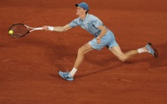 Jannik Sinner plays a forehand to Clement Tabur at the French Open