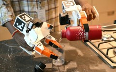 At an Objectways studio, AI system trainers film themselves performing household tasks in fake, fully furnished apartment rooms