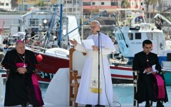 Pope Leo XIV delivers a speech during a meeting with organizations working with migrants in the port of Arguineguin on the Canary Island of Gran Canaria, a place accustomed to the arrival of migrants