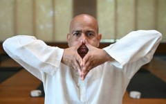 Varun Veer, founder of Lifeyoga, demonstrates 'Pranayama' at his studio in New Delhi
