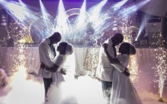Twin brothers Taiwo and Kehinde Oguntoye dance with twin sisters Taiwo and Kehinde Adediran at their double wedding reception