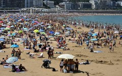 People packed beaches in Portugal and Spain, such as this one in San Sebastian