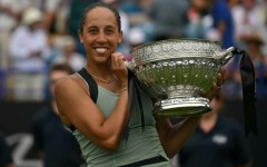 Madison Keys poses with the trophy after beating Tatjana Maria in the Eastbourne final