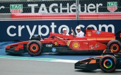 Charles Leclerc drives with Lewis Hamilton a passenger in a Lego Ferrari in Miami in May