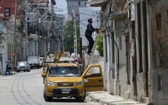 An electrician works on the power grid in Havana during a nationwide power outage in Cuba, the third in six months
