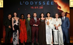 The cast of "The Odyssey" pose with director Christopher Nolan (right) at the Paris premiere