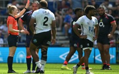Referee Hollie Davidson shows a red card to Fiji's scrum-half Simione Kuruvoli (right) during the Nations Championship match against England