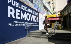 Rio de Janeiro municipal workers went through the streets this week covering up billboards with the message: 'Betting ad REMOVED'