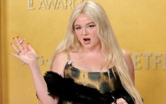 Megan Stalter with a prop cigarette on the red carpet of the 2026 Actor Awards