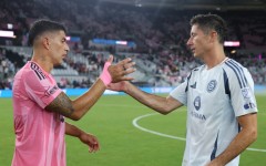 Luis Suarez of Inter Miami (left) and Robert Lewandowski of Chicago Fire after Miami's win
