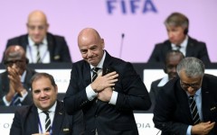 FIFA President Gianni Infantino (C) faces mounting problems after UEFA threatened legal action over his shelved plan