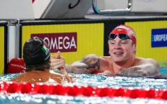 Adam Ramsay-Peaty (R) congratulates winner Nicolo Martinenghi of Italy