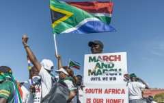 Anti-migrant protesters gathered outside the venue of a southern Africa regional summit