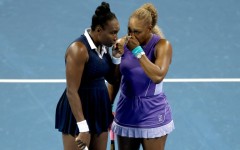 Sisters Venus Williams, left, and Serena Williams, 14-time Grand Slam doubles champions who had not played together competitively in four years, lost in their first match at the WTA and ATP Cincinnati Masters