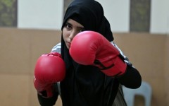 Hoorain Zahra shadow-boxing during a sparring session at a local boxing club in Karachi's Lyari town