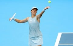 Iga Swiatek of Poland reached the semi-finals of the Cincinnati event after her opponent retired with a heel injury