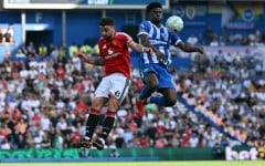 Carlos Baleba (R), playing against Manchester United in May, said the move to the Premier League giants was a 'dream'