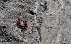 Fire and rescue personnel conduct search and rescue operations at Gyirong Port, which was destroyed by a mudslide two days earlier, in Gyirong County, in China’s western Tibet region