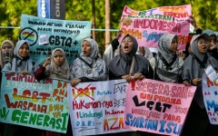 Protesters take part in an anti-LGBTQ rally organised by pro-Islamic organisations in Surabaya on August 9, 2026