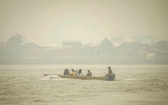 Indonesians on Borneo island say they acrid yellow haze has damaged their health