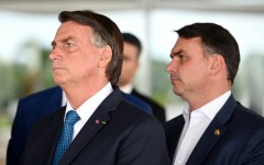 Jair Bolsonaro (L) remains the leader of his political movement in Brazil and selected Flavio Bolsonaro (R) to run for president in his place